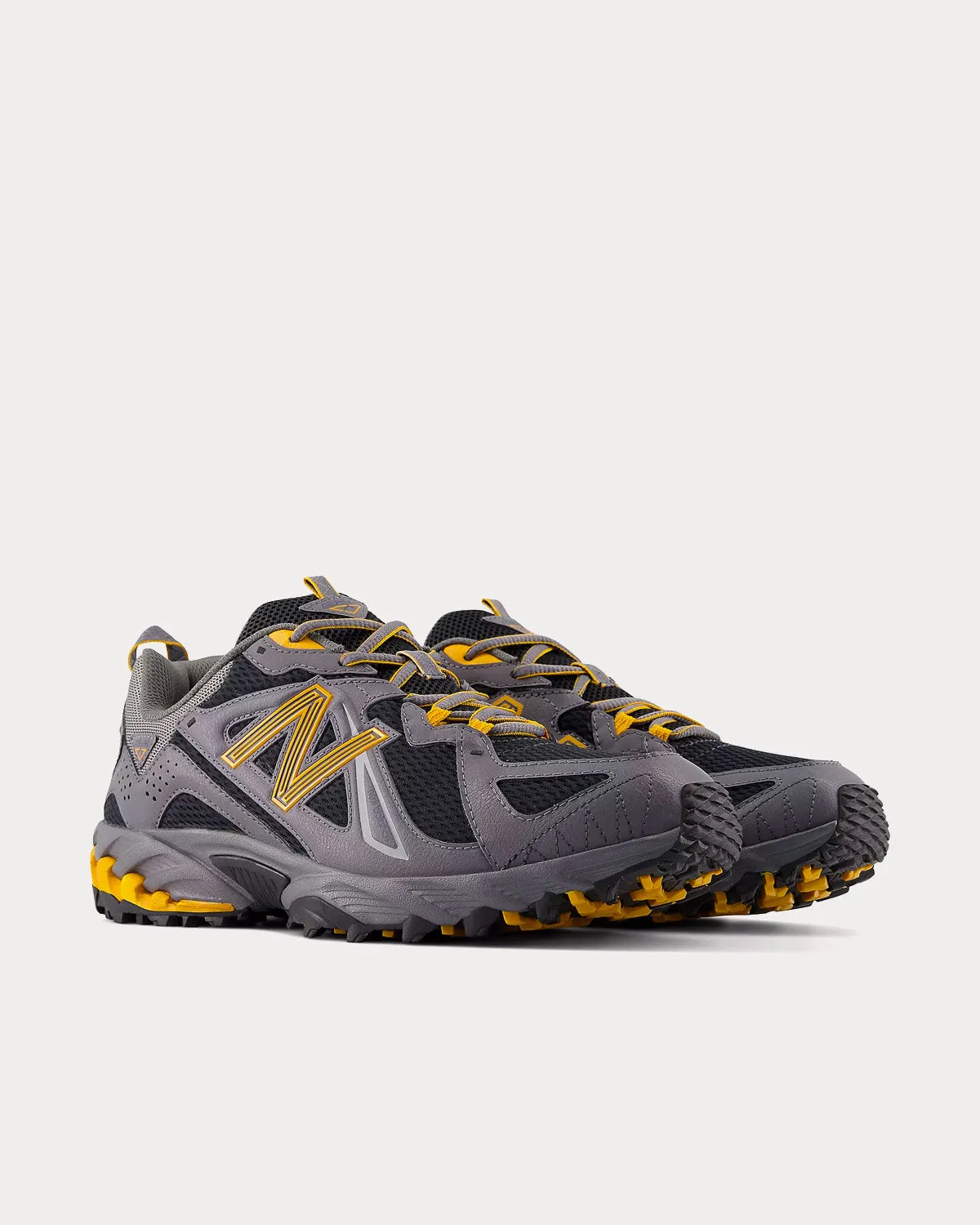 610v1 Castlerock / Varsity Gold / Phantom Low Top Sneakers